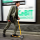 Robert Bartz rides a Ciro Magic scooter at the Cebit computer fair in Hanover, Germany in 1999. Don’t you love it when your scooter matches your tie!